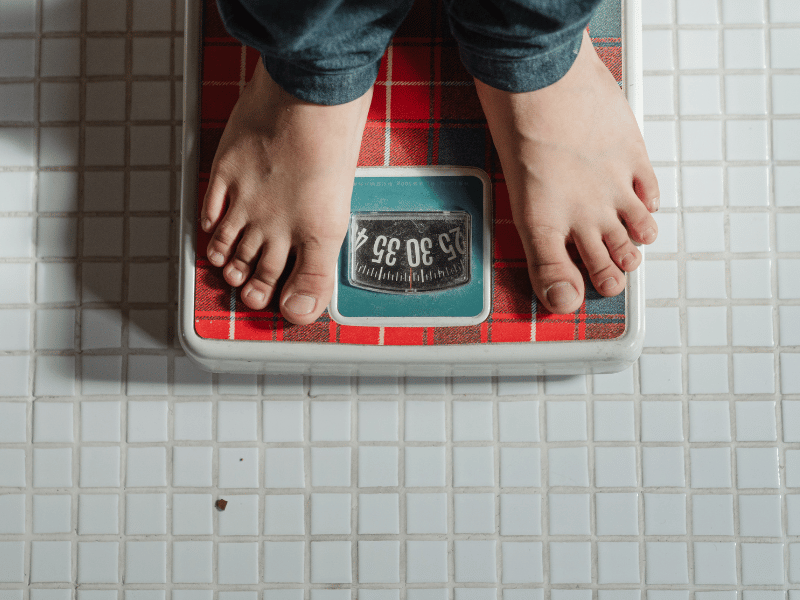 Feet on a Weighing scale